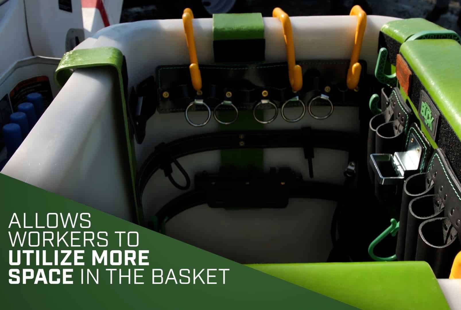 Green aerial lift basket interior with lanyard rings