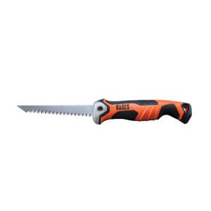 Orange and black handled hand saw.