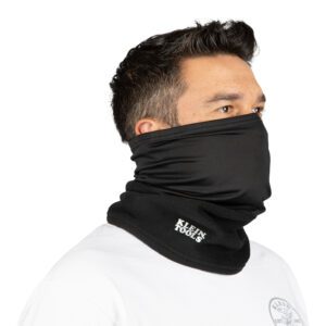 Man wearing black neck gaiter, side view.