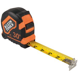 Tape measure with extended yellow blade.